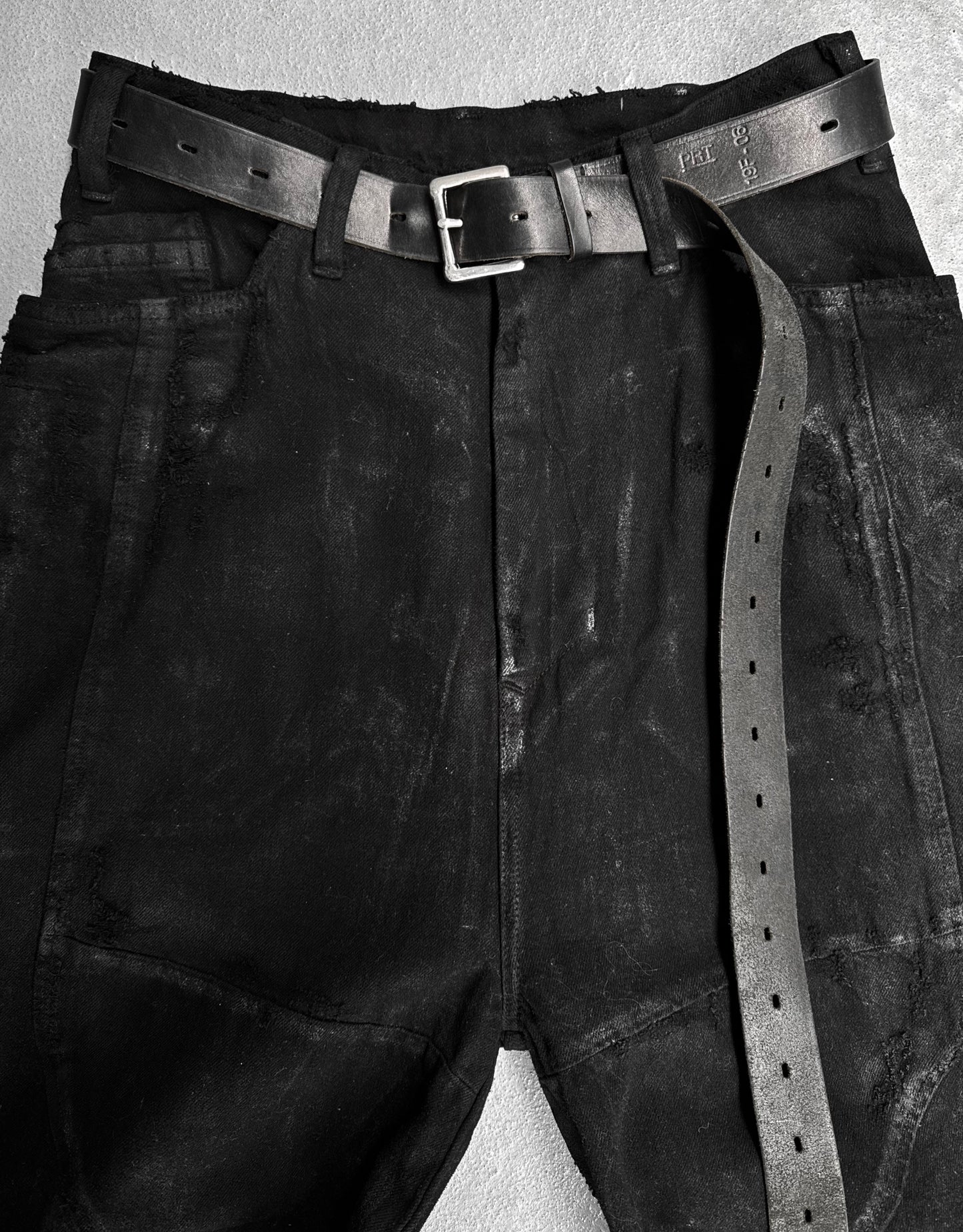 Julius_7 AW24-25 “rift;” Distressed Waxed 10oz Wide-Leg Denim