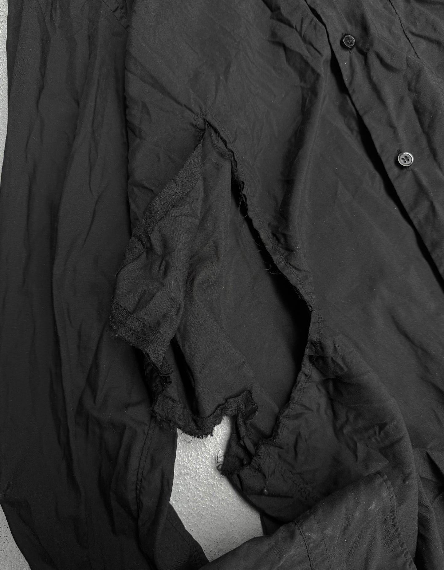 BLACK COMME des GARÇONS SS19 Distressed Side Cut-Out Shirt
