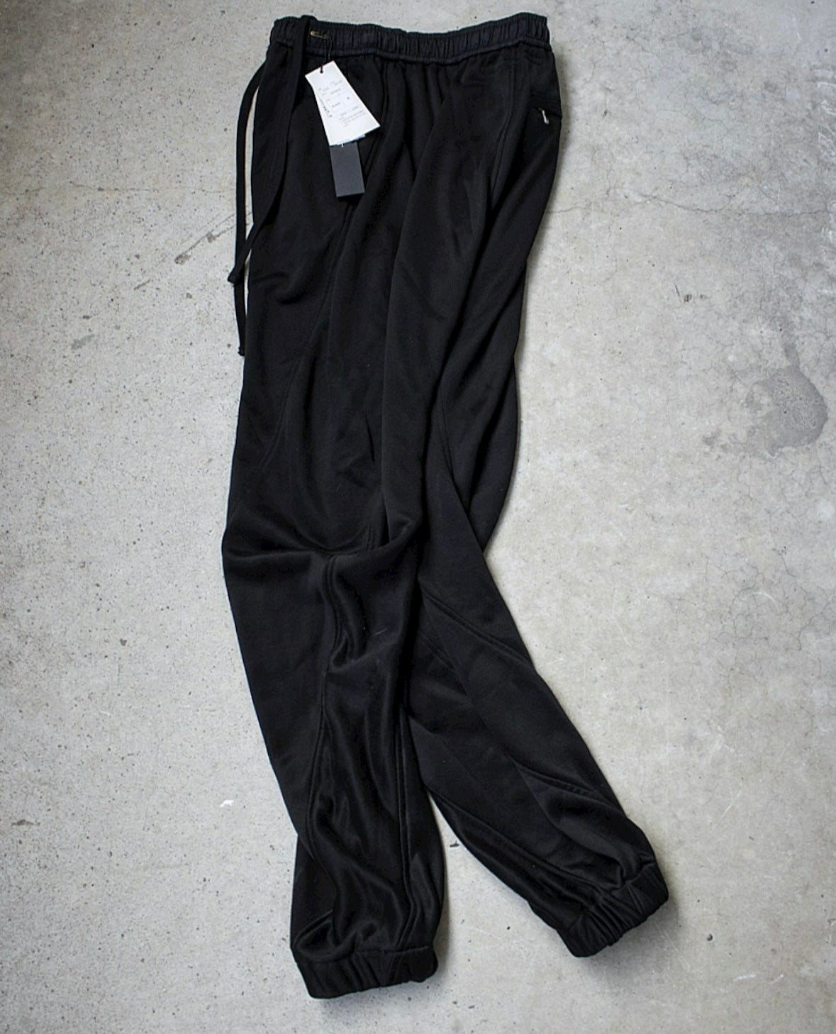 Julius_7 AW22 “EREBUS;” Twisted Seam Track Pants