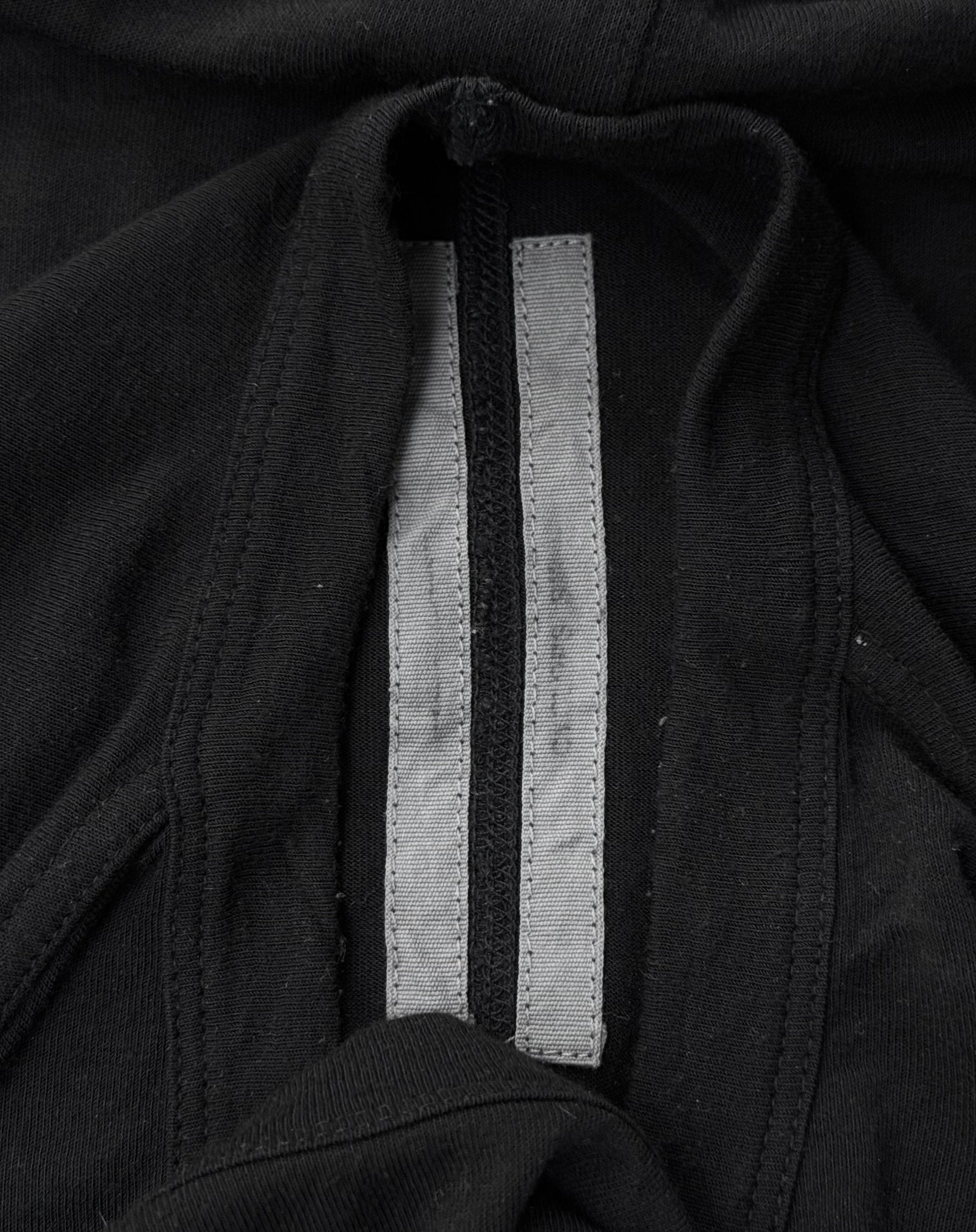Close-up of a Rick Owens SS16 “CYCLOPS” Black Silk-blend Sheer Long-sleeve in Size XL, showing a gray fabric strip sewn into the inside seam, likely for reinforcement. Condition: 9/10.