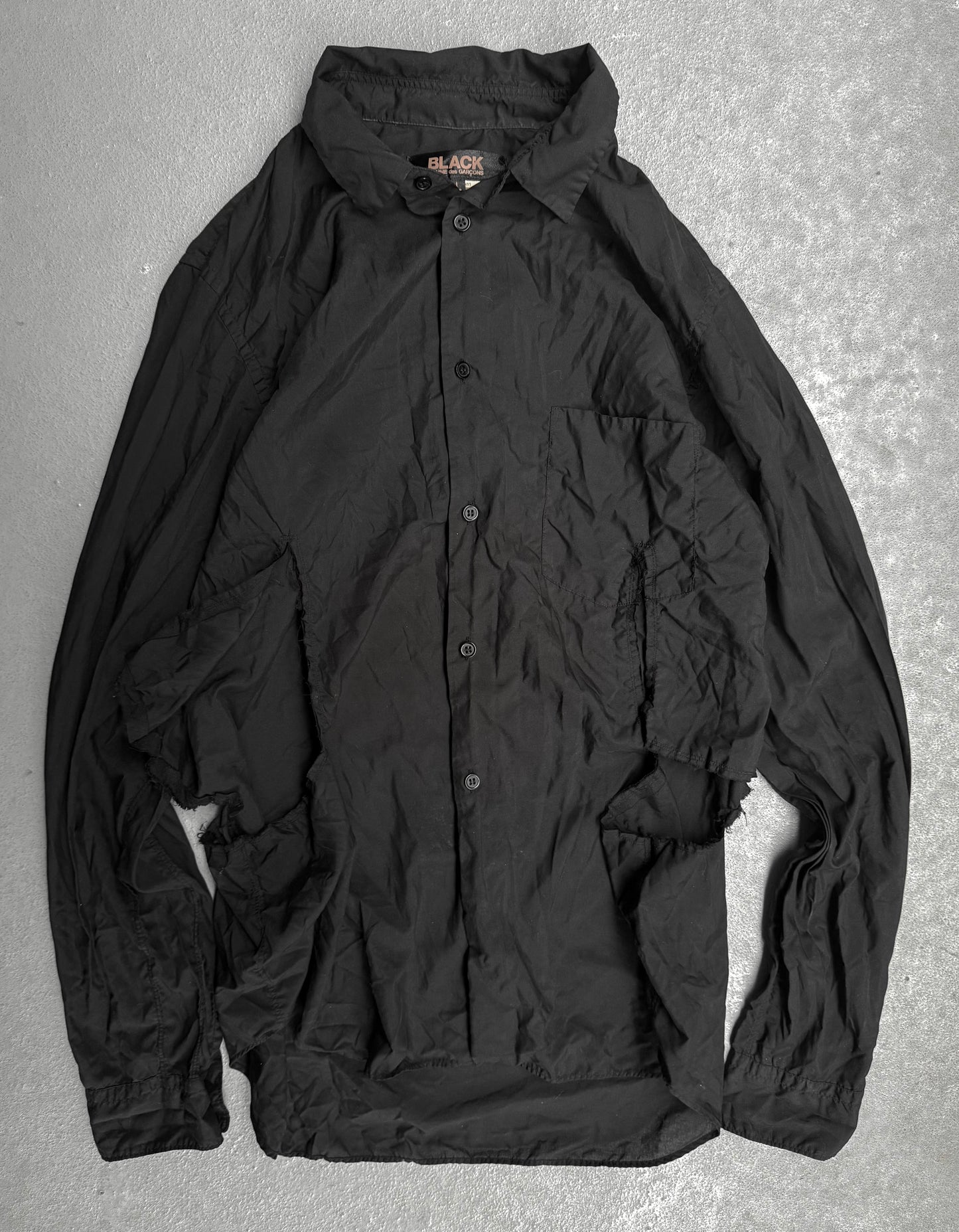 BLACK COMME des GARÇONS SS19 Distressed Side Cut-Out Shirt