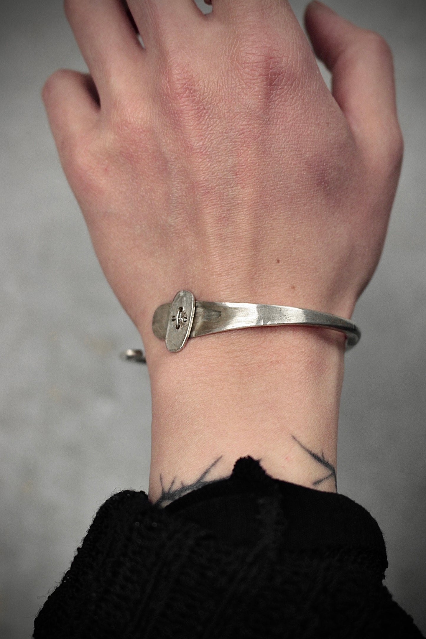 m.a+ by Maurizio Amadei SS18 'AB12 AG' Button Tip Silver Bangle detail | DRIEW GARMENTS
