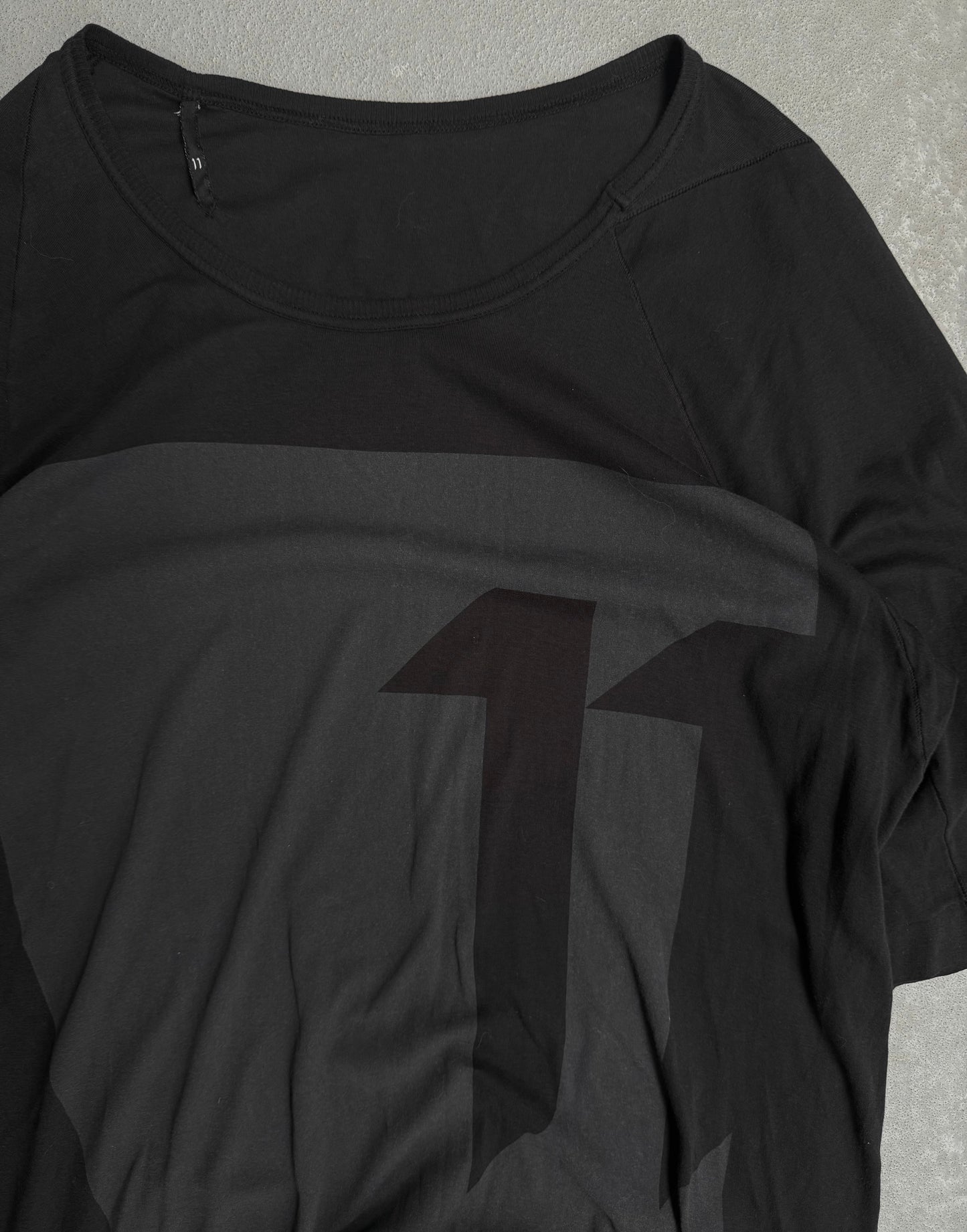 11 by Boris Bidjan Saberi 'TS1 P2 F1103' "11" Graphic Longline T-shirt