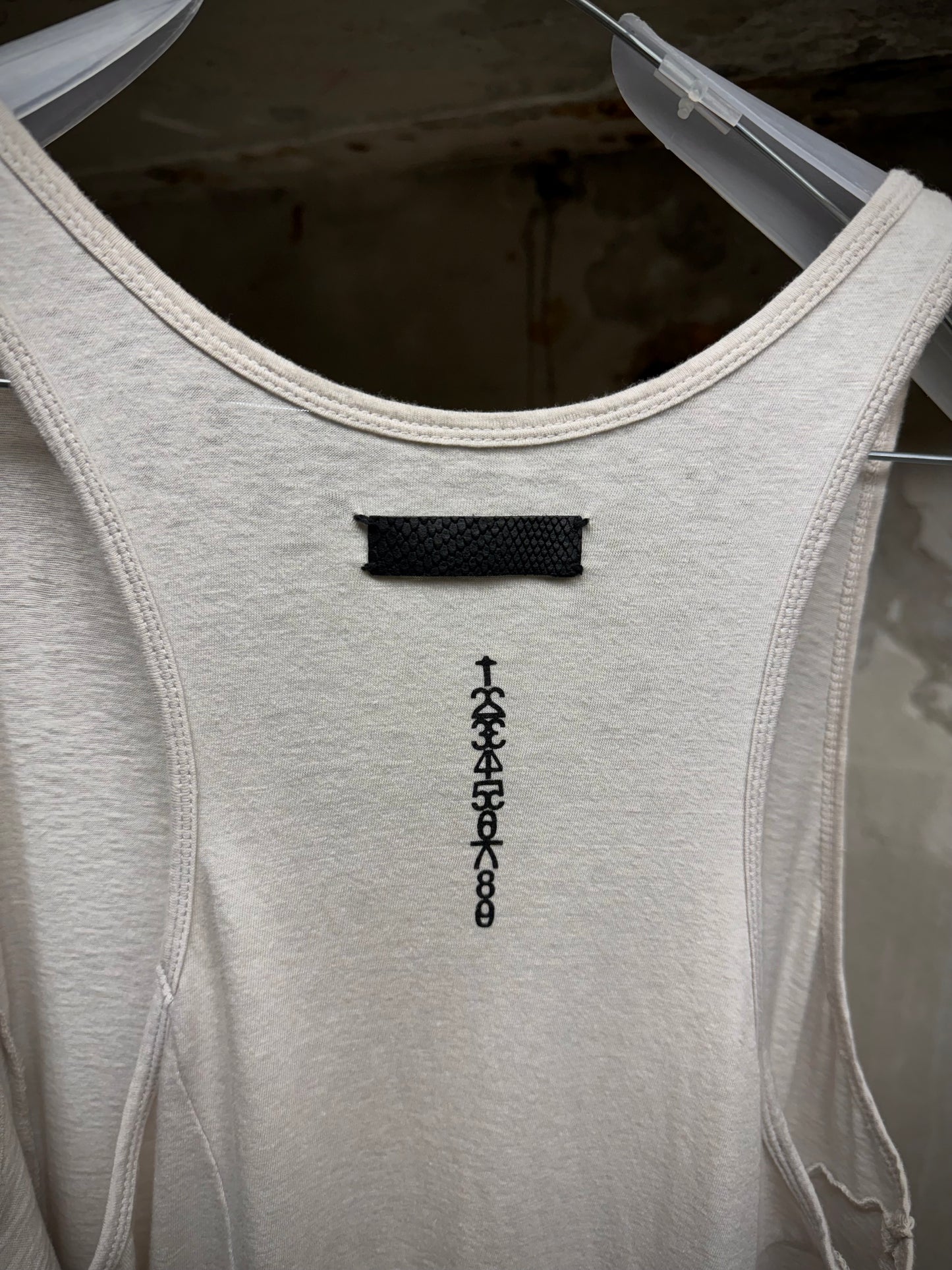 IfSixWasNine 'No. BONE-2/TK/M' Asymmetrical Raw Hem Cut Tank Top detail | DRIEW GARMENTS