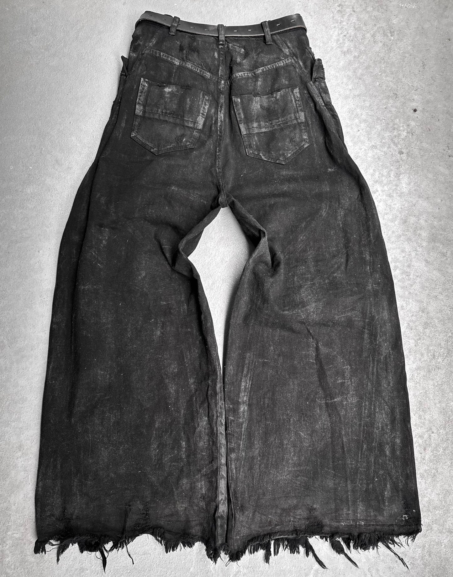 Julius_7 AW24-25 “rift;” Distressed Waxed 10oz Wide-Leg Denim
