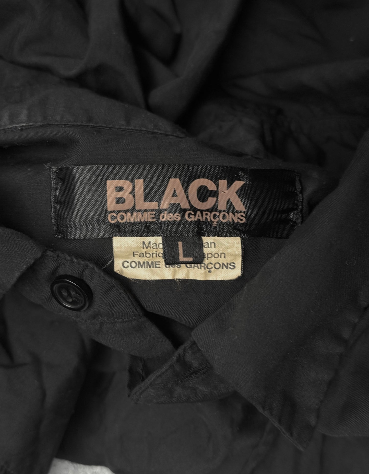 BLACK COMME des GARÇONS SS19 Distressed Side Cut-Out Shirt