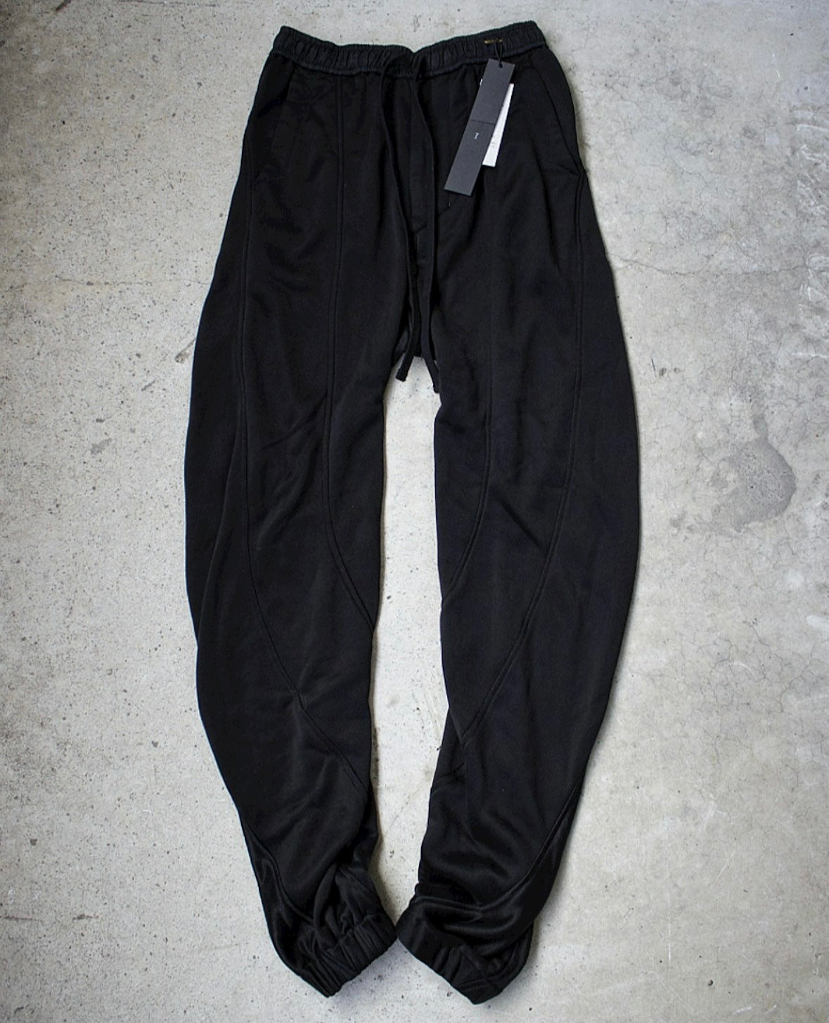 Julius_7 AW22 “EREBUS;” Twisted Seam Track Pants
