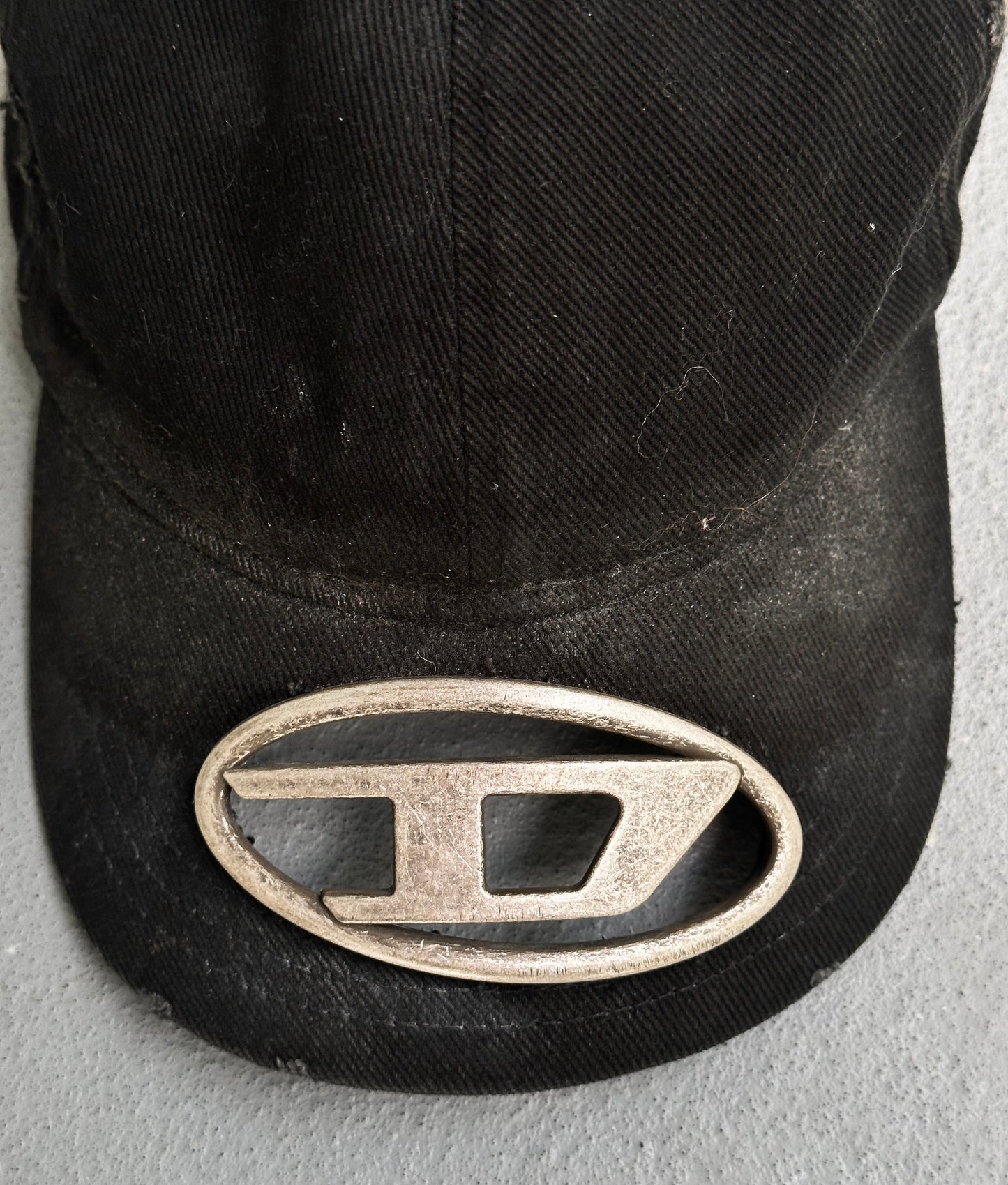 DIESEL by Glenn Martens ‘C-Beast-A1’ Distressed Mud-wash Metal Logo Plaque Cap