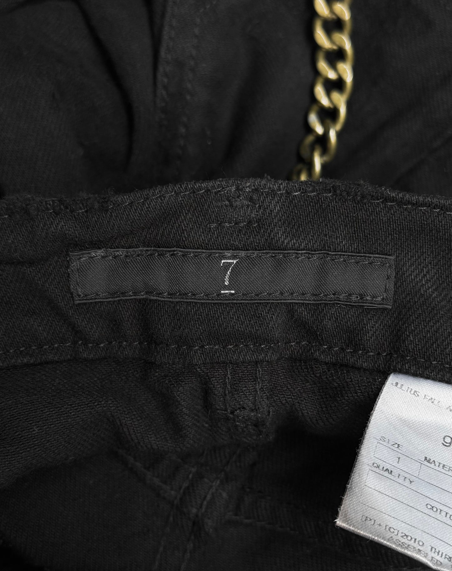 Julius_7 AW11 “goth_ik;” Distressed Twisted Cut Zip Denim