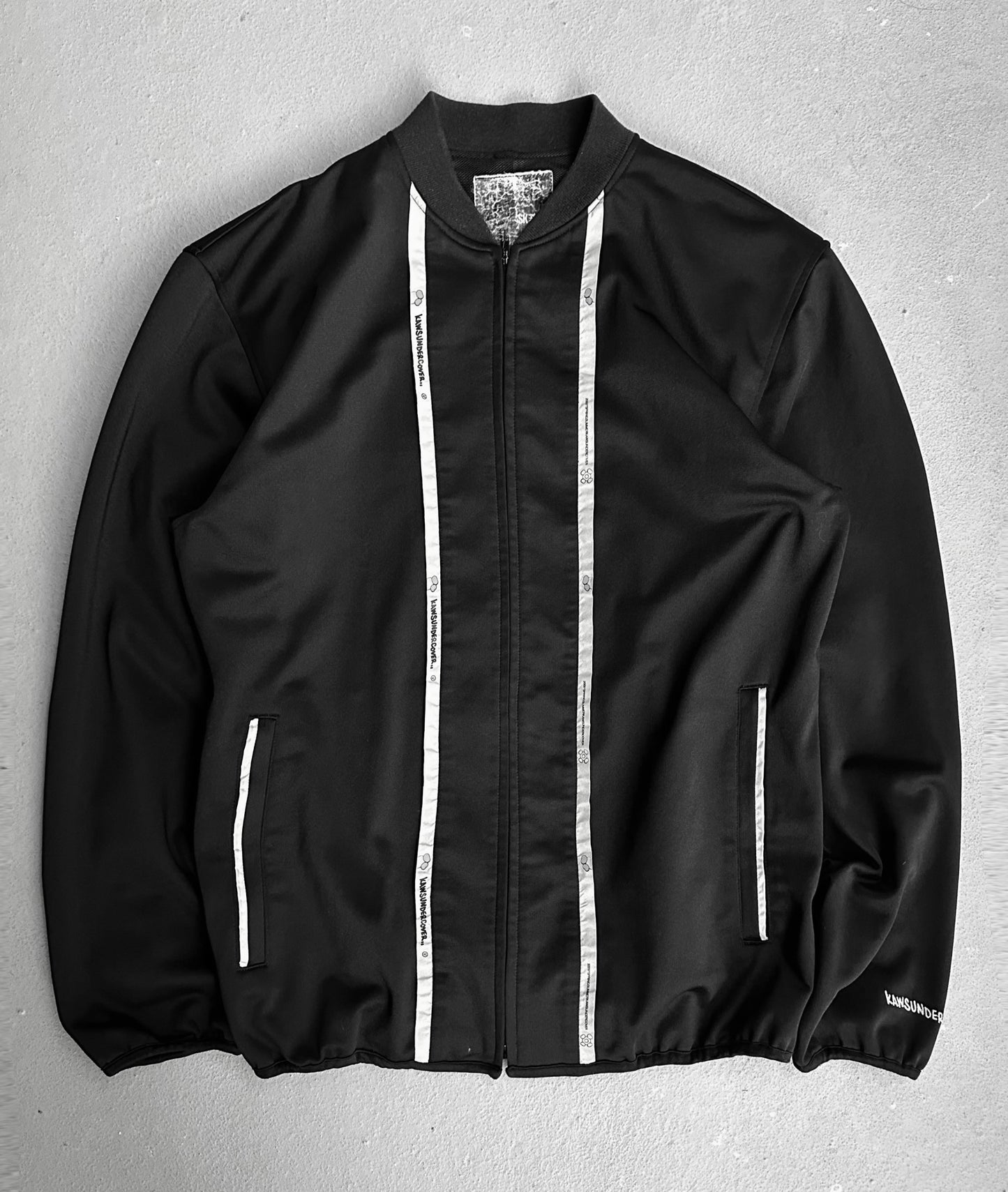 UNDERCOVER x KAWS SS00 Reflective Track Bomber Jacket
