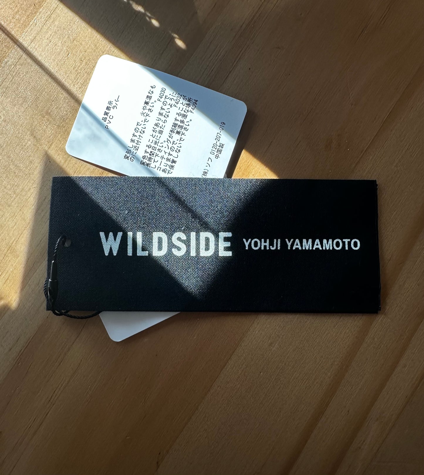 brand tag detail shot Yohji Yamamoto WILDSIDE x F.C Real.Bristol Black Rubber Duck