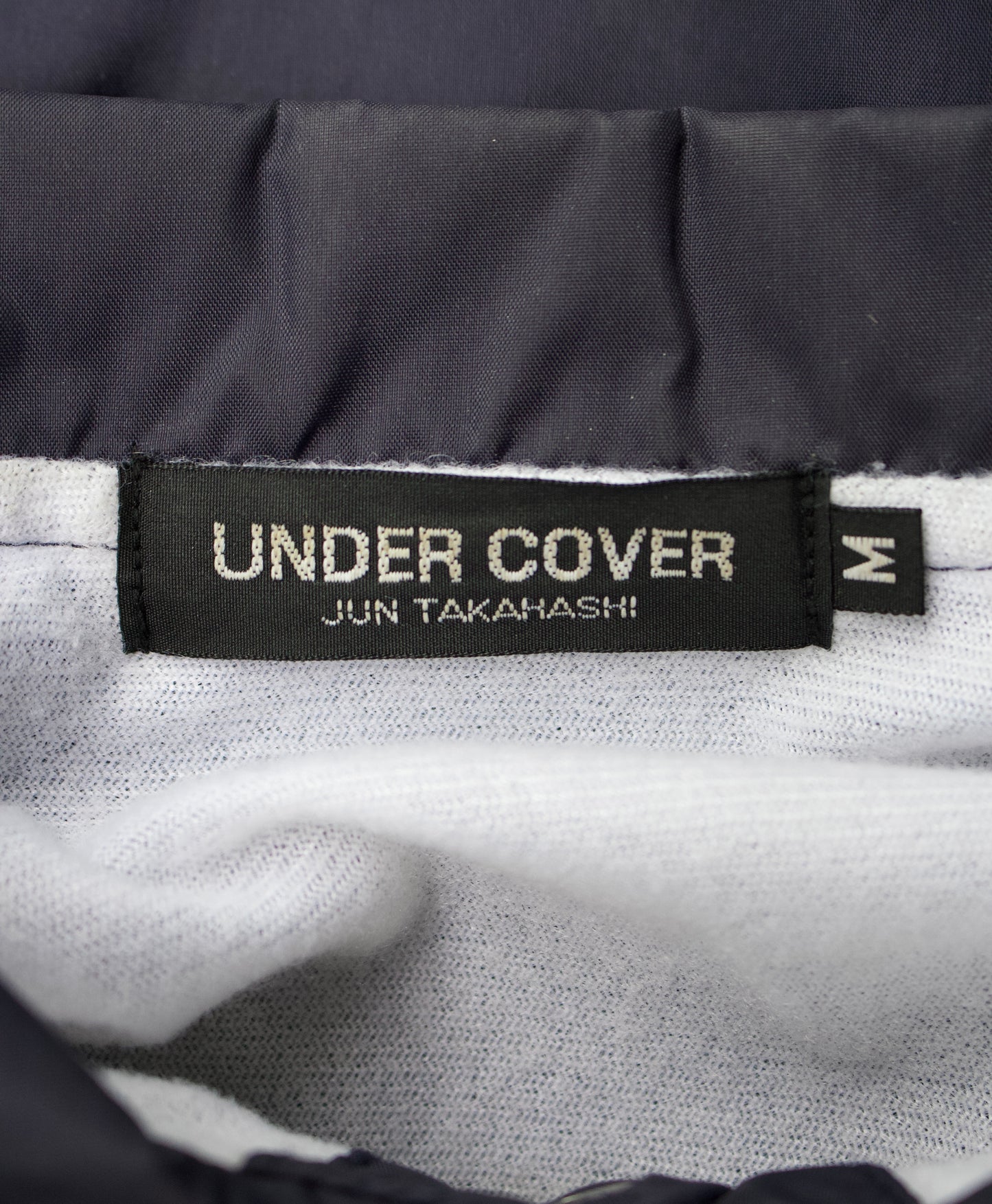 UNDERCOVER Early 00s Faded Logo Coach Jacket