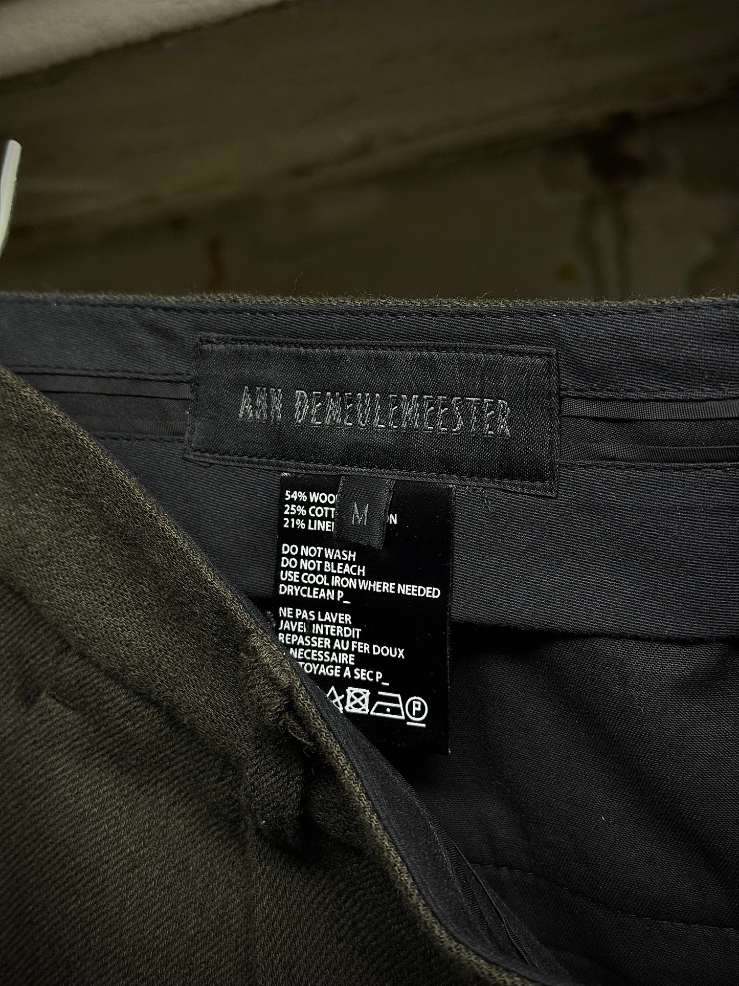 Ann Demeulemeester 2010s Khaki Wool Pleated Dress Pants detail | DRIEW GARMENTS