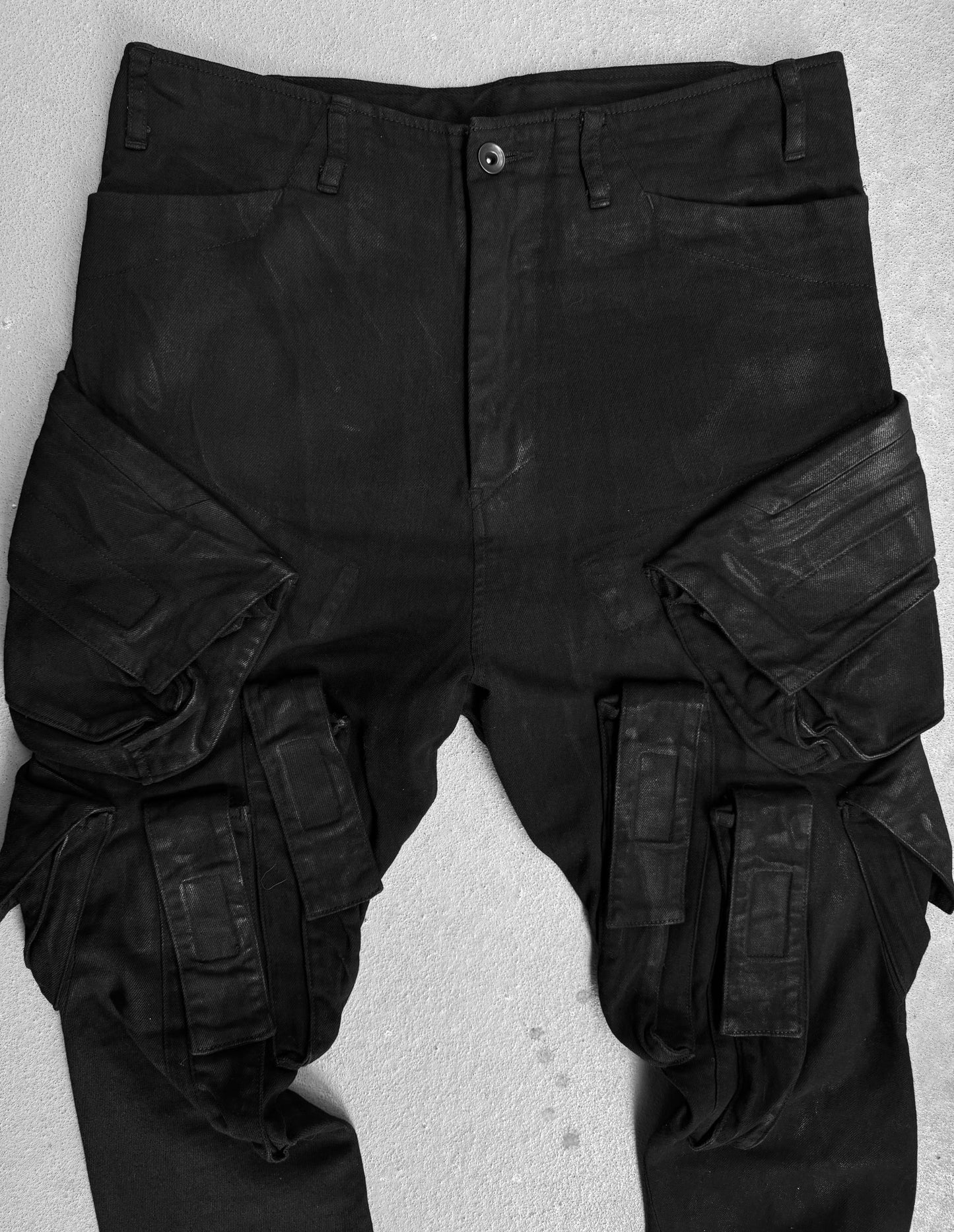 Julius_7 SS15 “prism;” Waxed Velcro Gas-Mask Cargos Skinny Denim