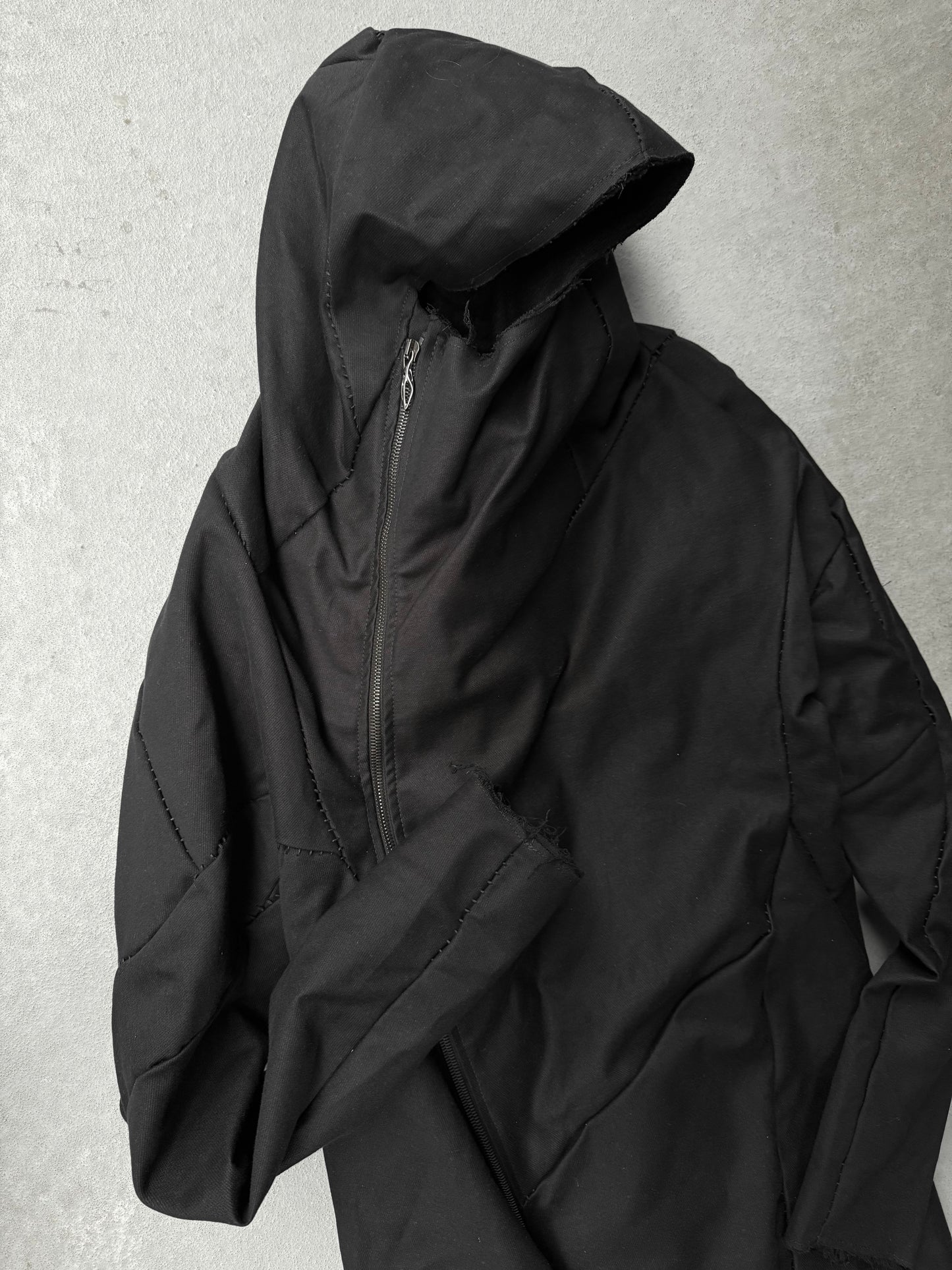 LEON EMANUEL BLANCK Distortion Curved Overlock Wool Lined Hooded Coat detail | DRIEW GARMENTS