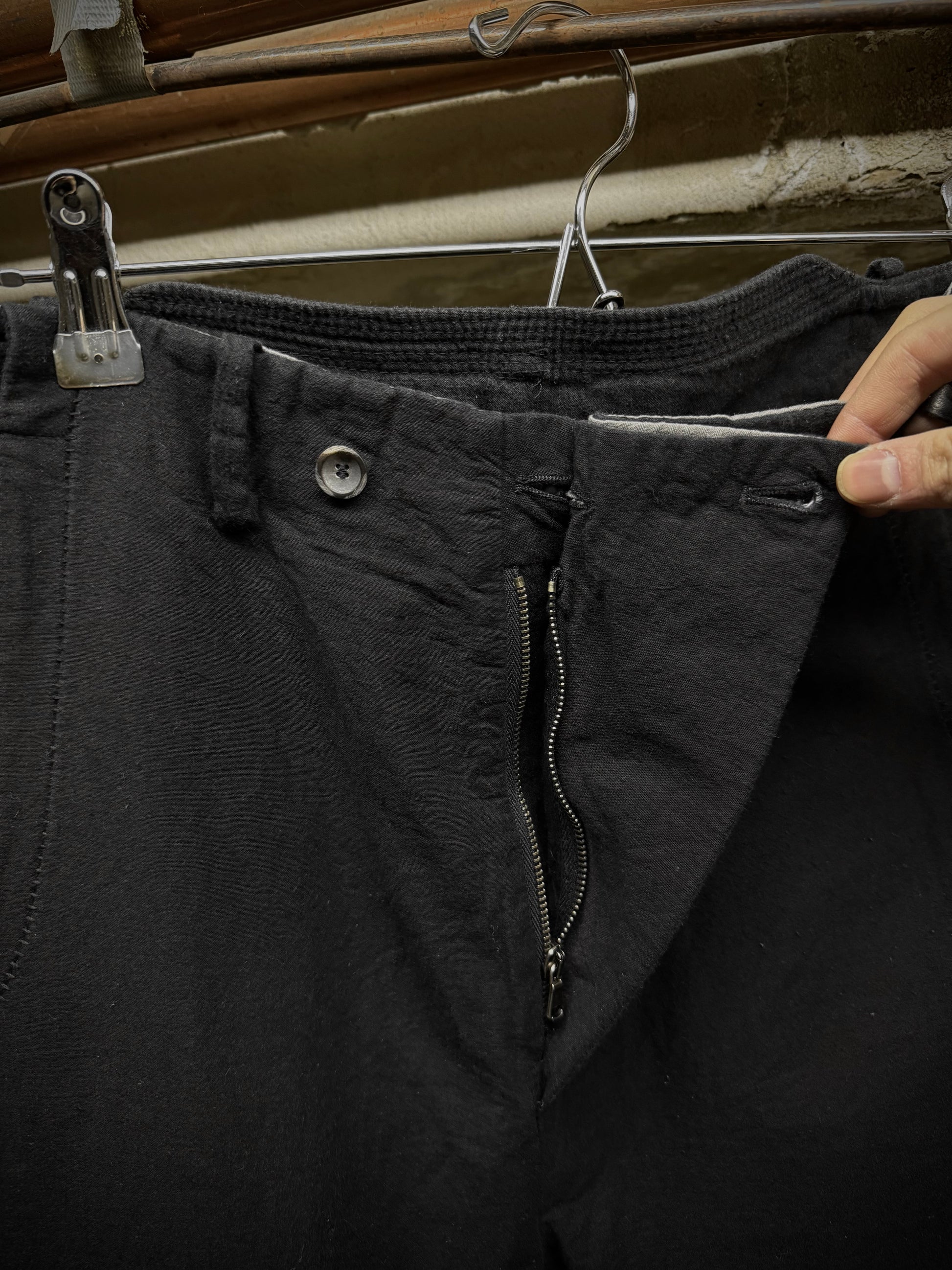 Masnada Washed Black Asymmetric Fly Overlock J-cut Pants detail | DRIEW GARMENTS
