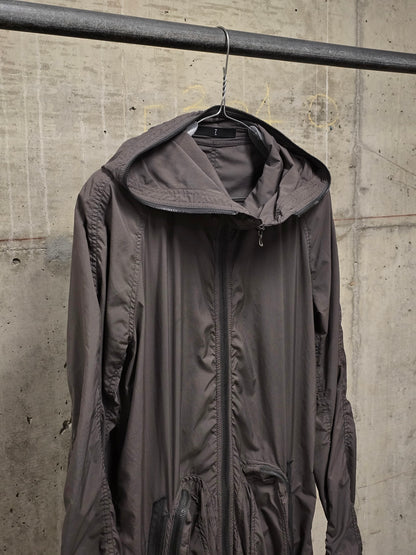 Julius_7 SS08 “Insanity In Industrial Inc.” Grey Hooded Poly Dual Zip Cargo Jacket