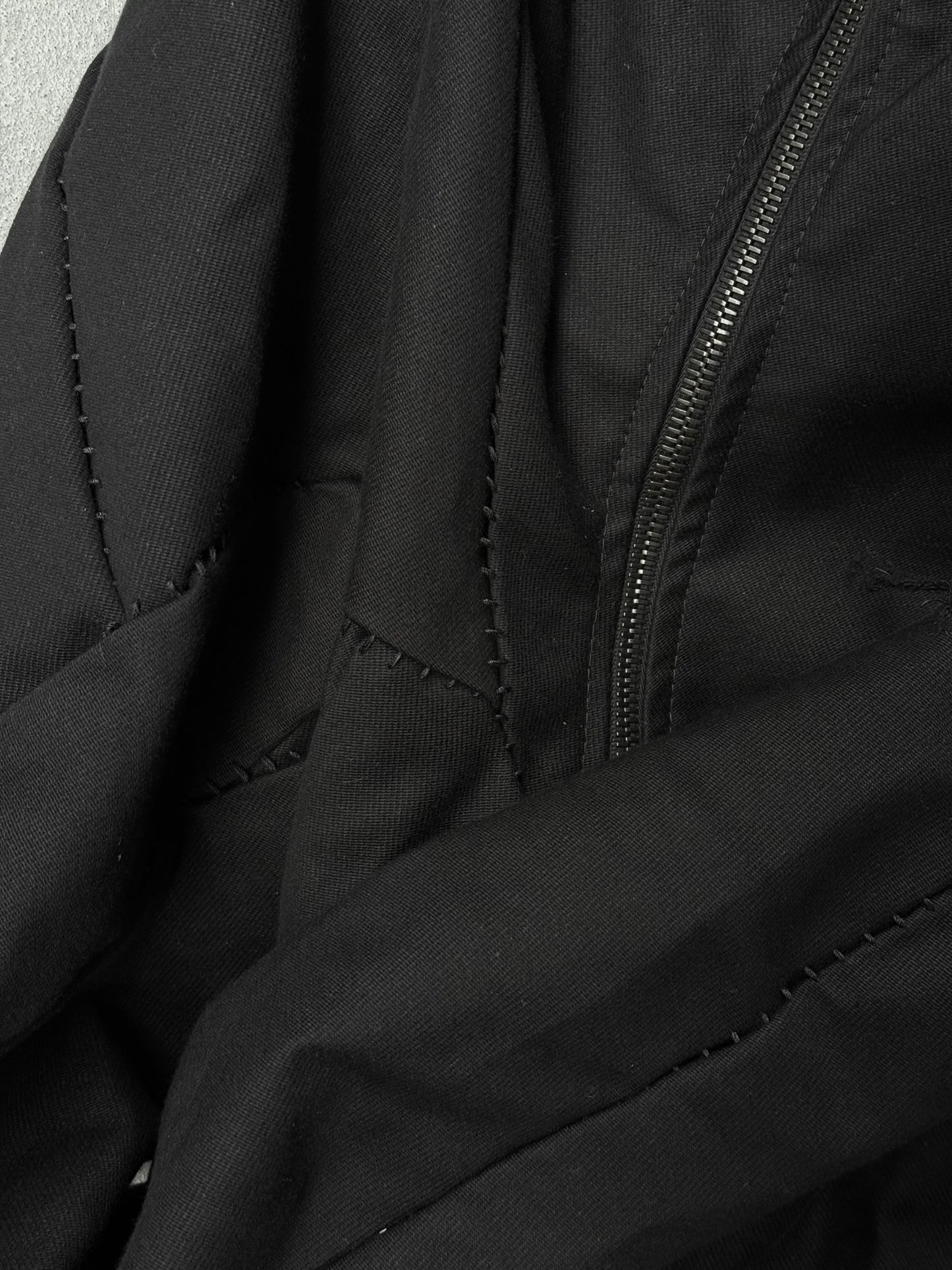LEON EMANUEL BLANCK Distortion Curved Overlock Wool Lined Hooded Coat detail | DRIEW GARMENTS