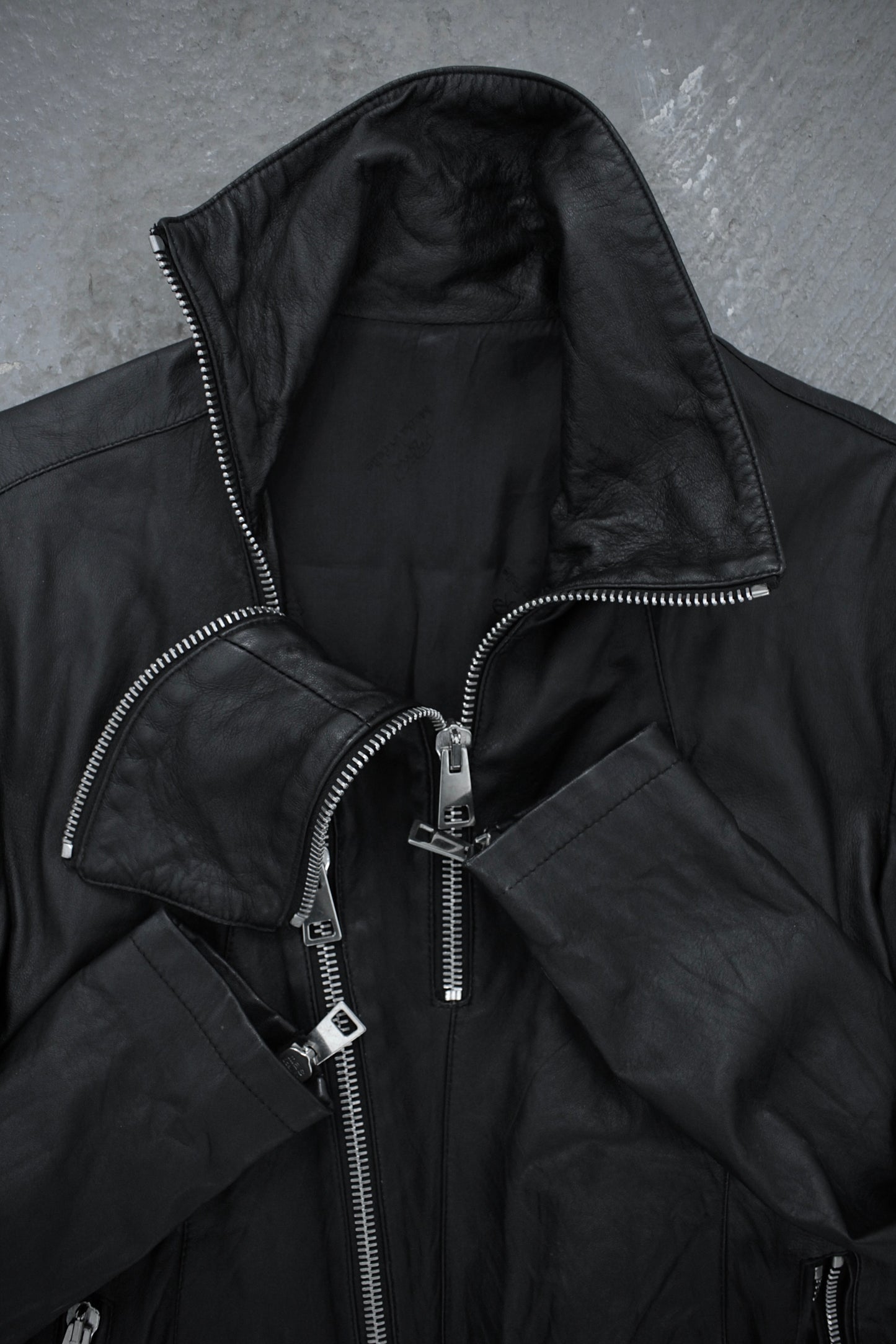 CLAUDIO IACOVELLI Asymmetrical Zip High Neck Calfskin Leather Jacket detail | DRIEW GARMENTS