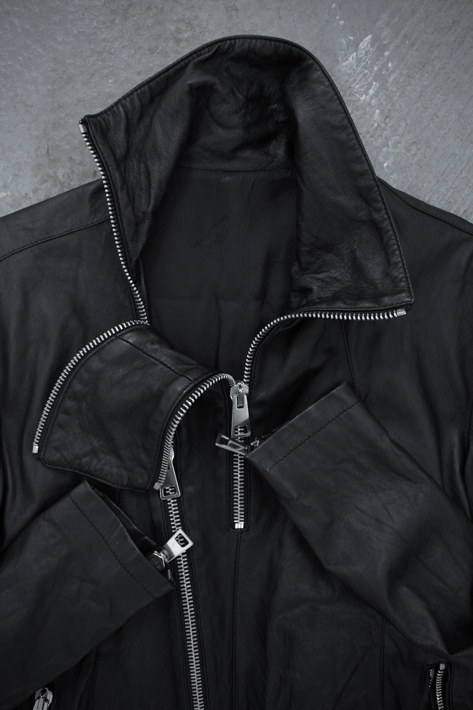 CLAUDIO IACOVELLI Asymmetrical Zip High Neck Calfskin Leather Jacket detail | DRIEW GARMENTS