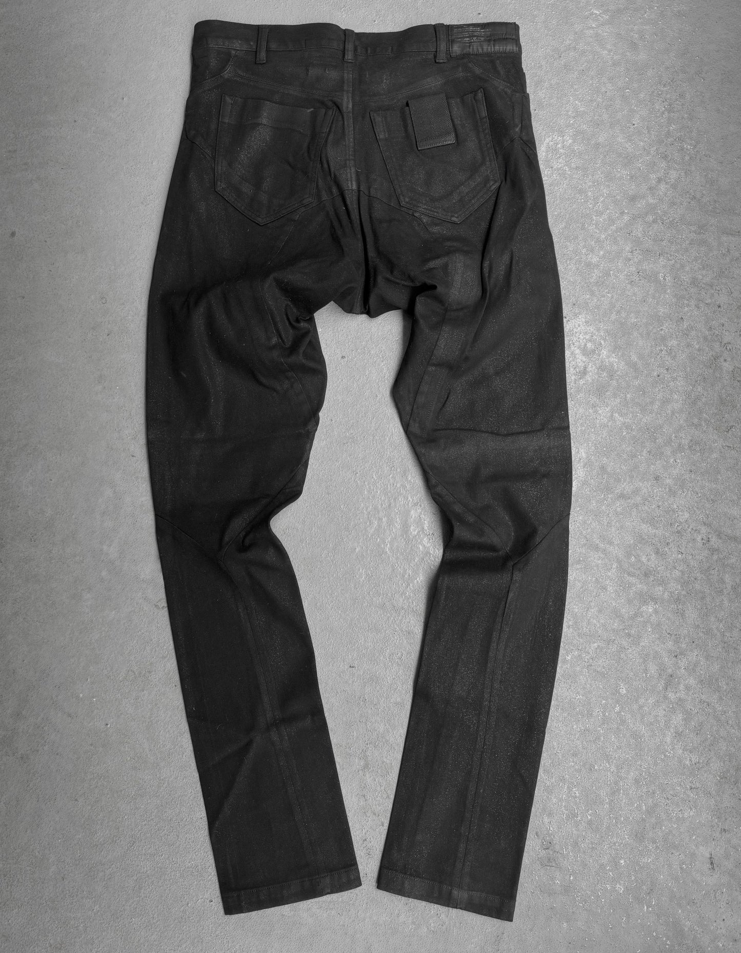 Julius_7 SS15 "prism;" Geometric Drop-crotch Wax Coated Knit Denim