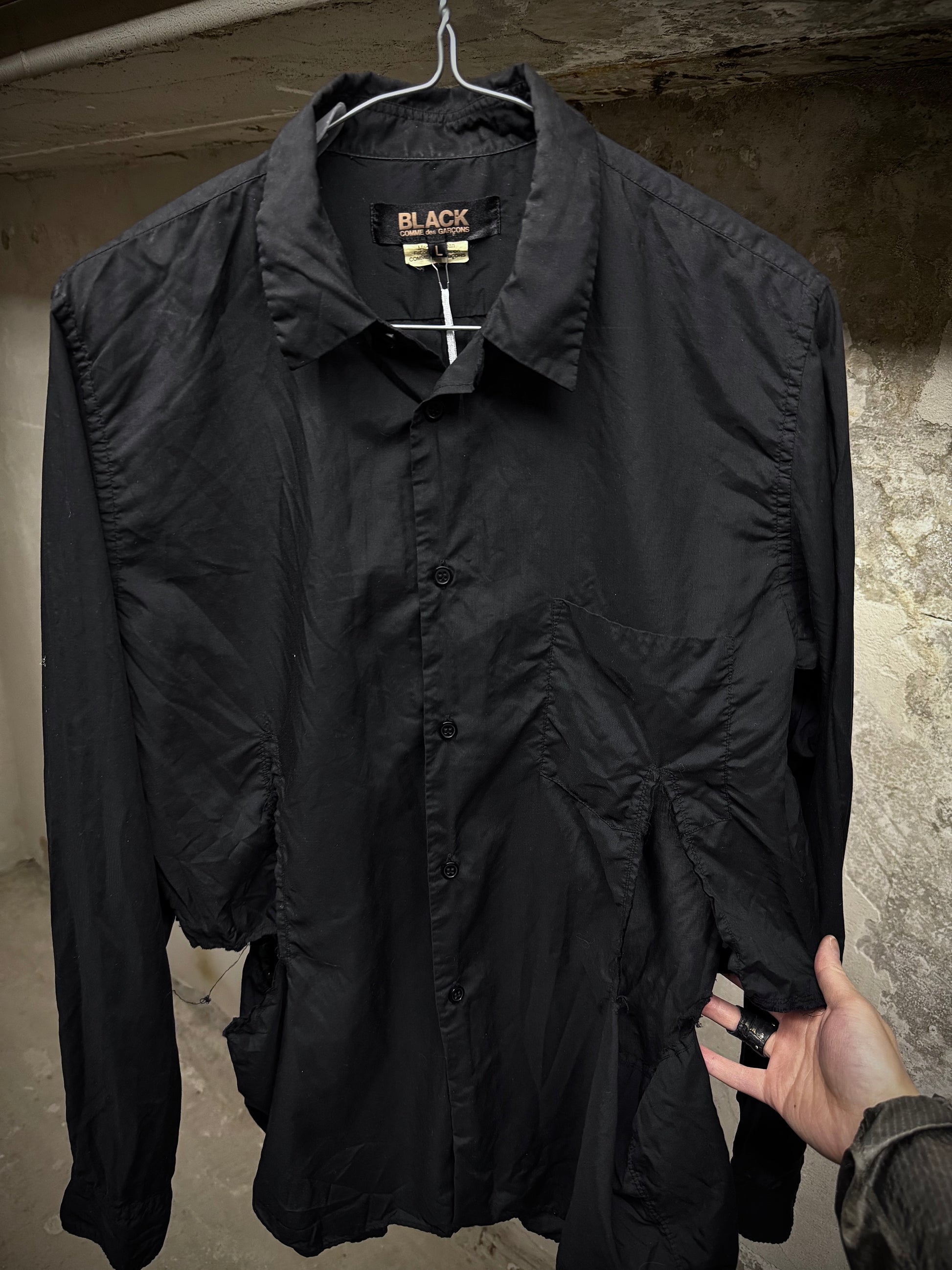 COMME des GARÇONS BLACK COMME des GARÇONS SS19 Distressed Side Cut-Out Shirt detail | DRIEW GARMENTS