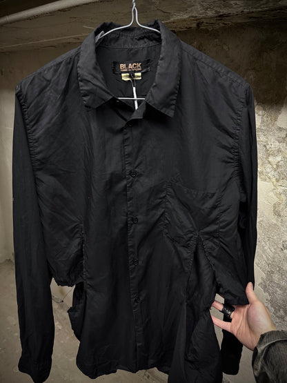 COMME des GARÇONS BLACK COMME des GARÇONS SS19 Distressed Side Cut-Out Shirt detail | DRIEW GARMENTS