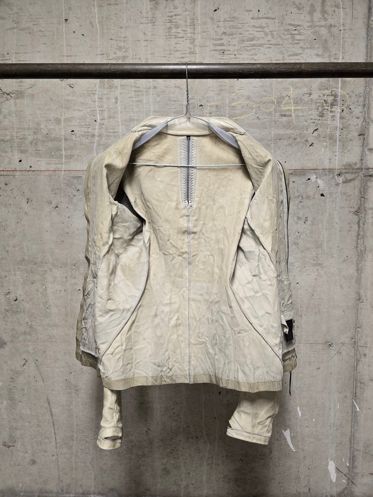Isaac Sellam: “Experience” Pale Yellow Overlock High Neck Metal Spine Lambskin Leather Jacket