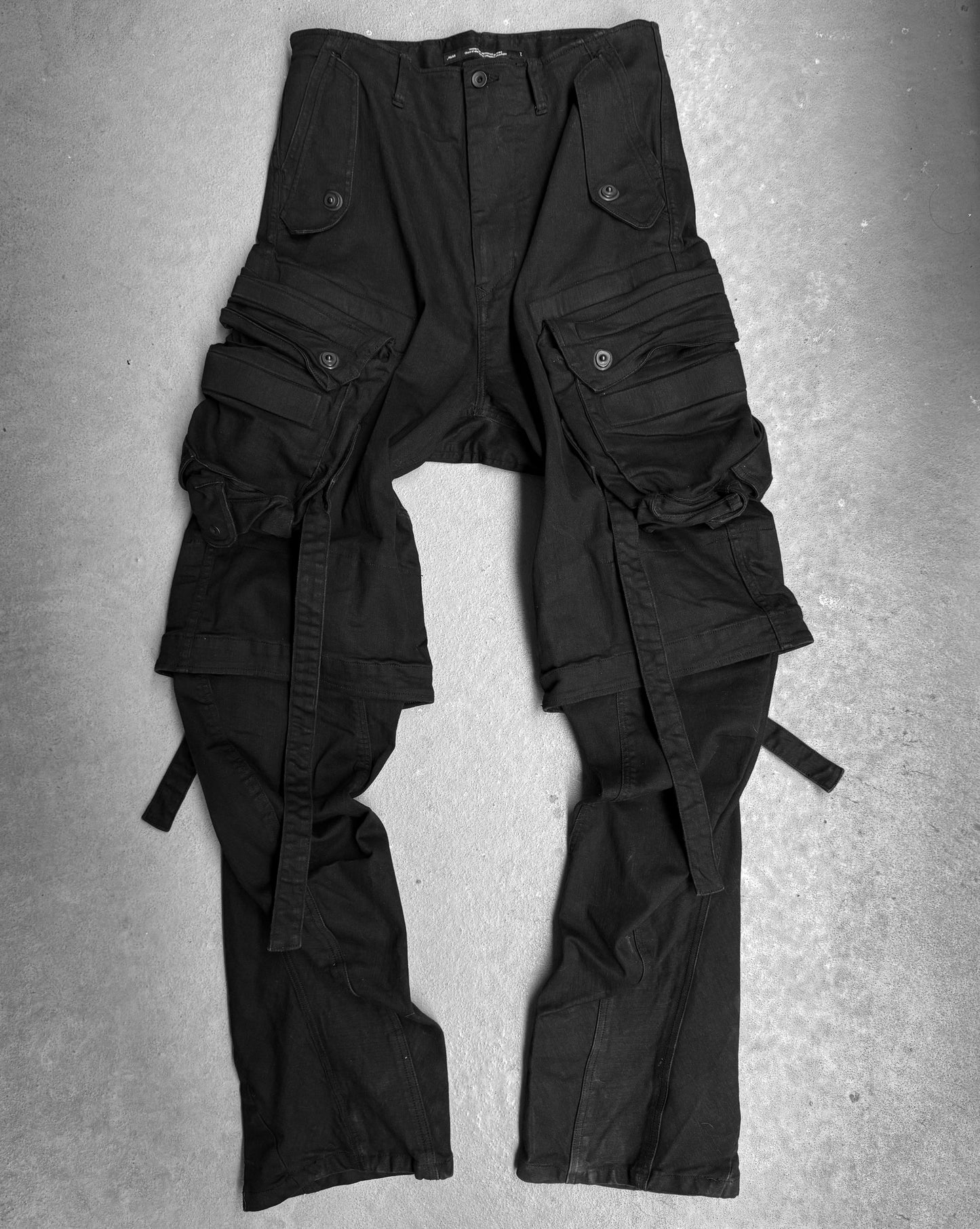 Julius_7 AW22-23 "_PERMANENT" Double Layered Twisted Gas-Mask Cargo Pants