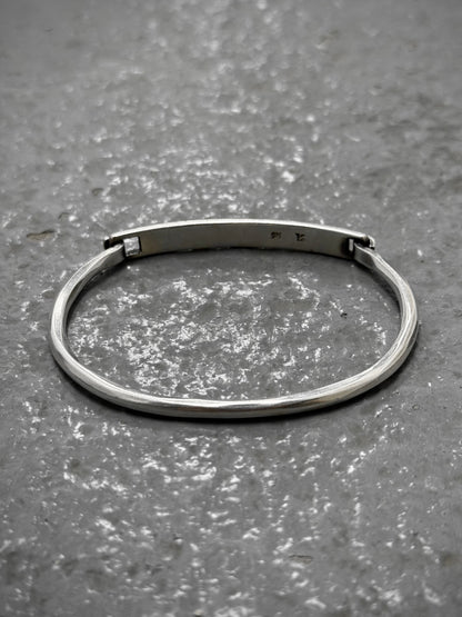 WERKSTATT:MÜNCHEN 'M2631' .925 Silver Tag Tool Traces Bracelet detail | DRIEW GARMENTS