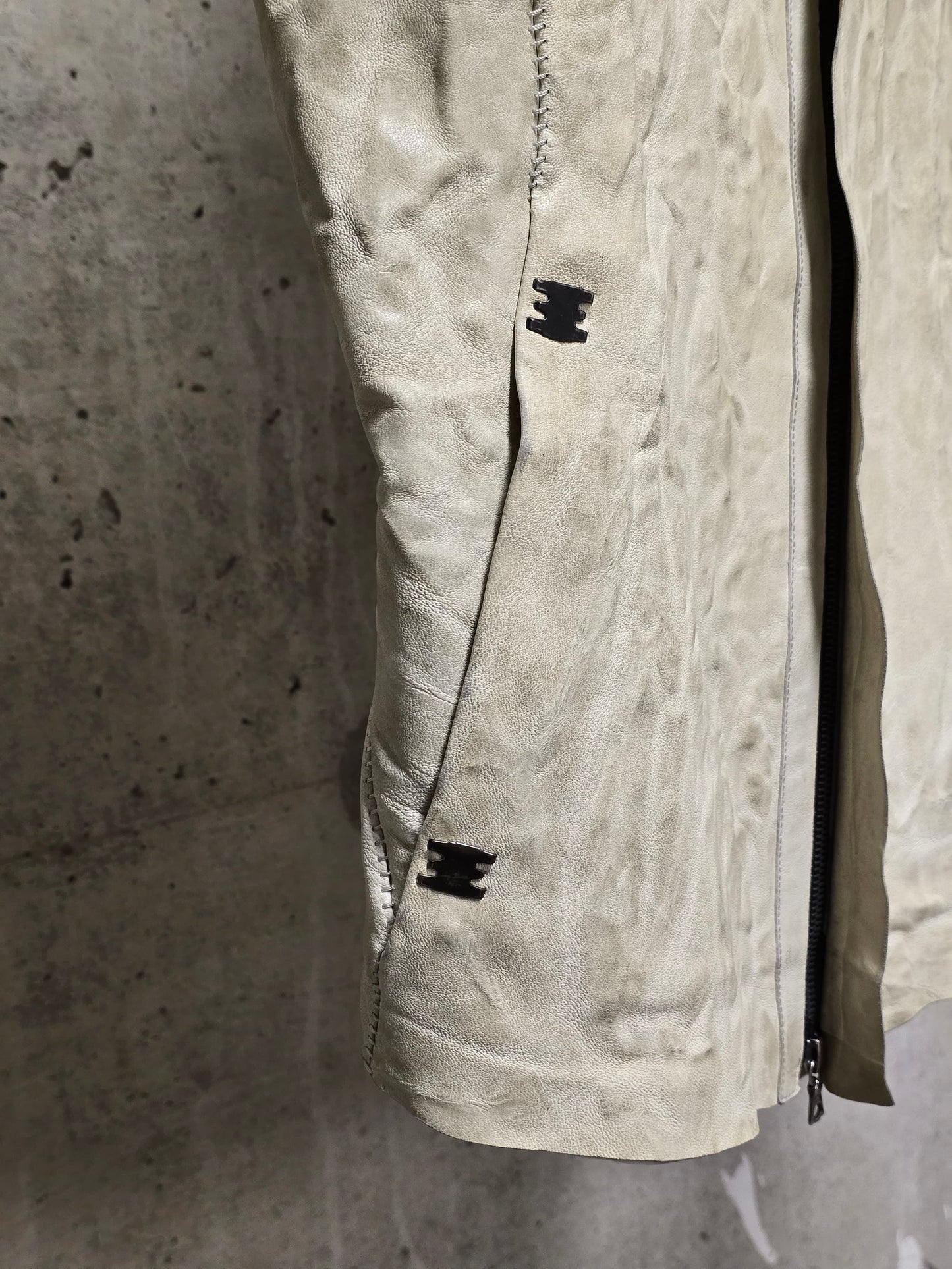 Isaac Sellam: “Experience” Pale Yellow Overlock High Neck Metal Spine Lambskin Leather Jacket