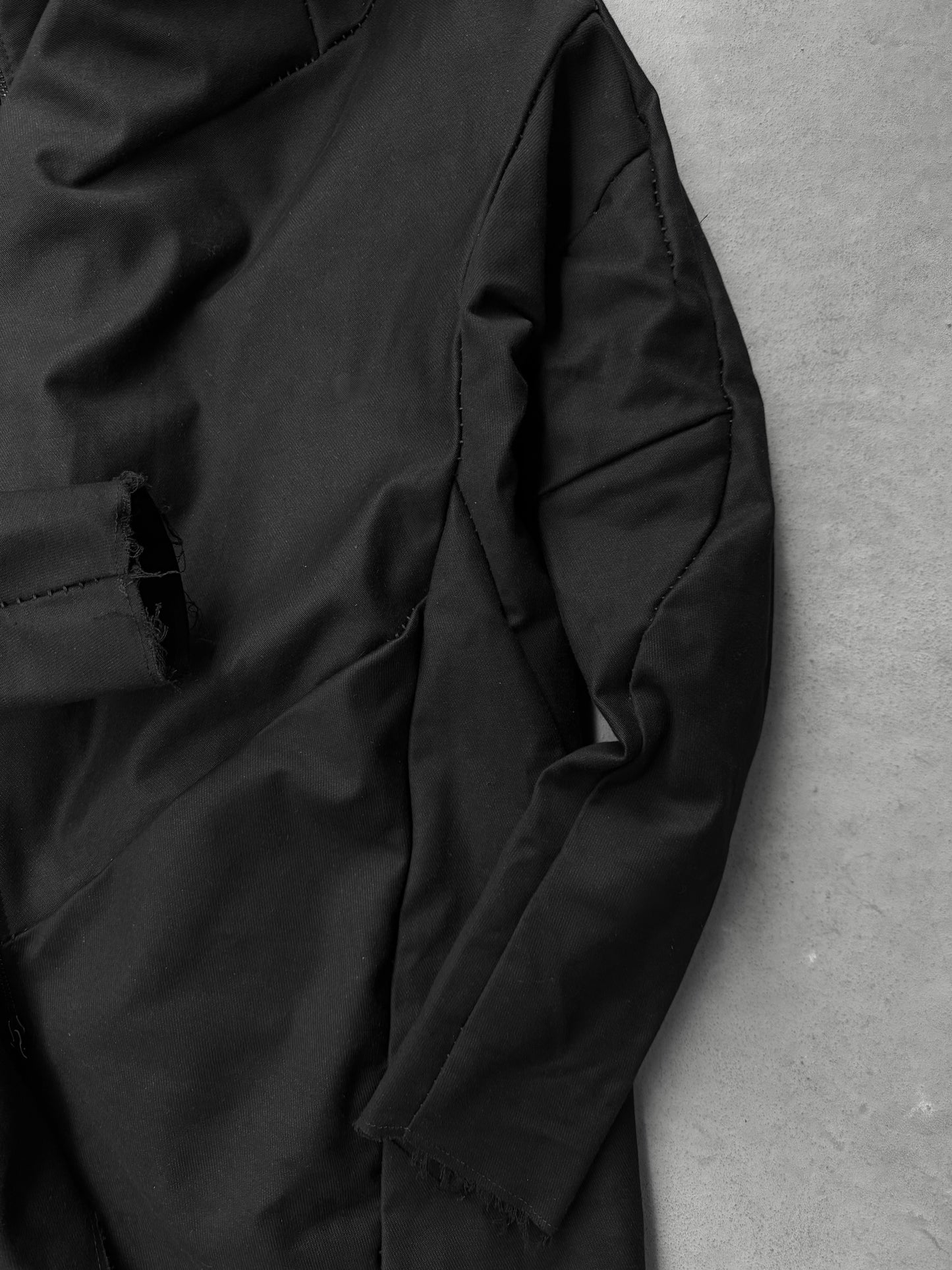 LEON EMANUEL BLANCK Distortion Curved Overlock Wool Lined Hooded Coat detail | DRIEW GARMENTS