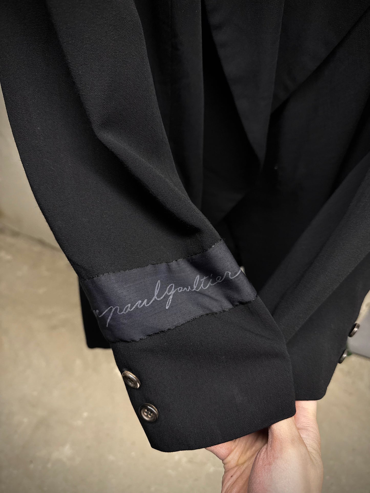COMME des GARÇONS Late 80s 'Jean Paul Gaultier' Woven Tag Asymmetric Open-front Blazer detail | DRIEW GARMENTS