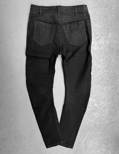 Julius_7 SS17 “Knives;” Distressed Wax Knee-Panel Skinny Denim