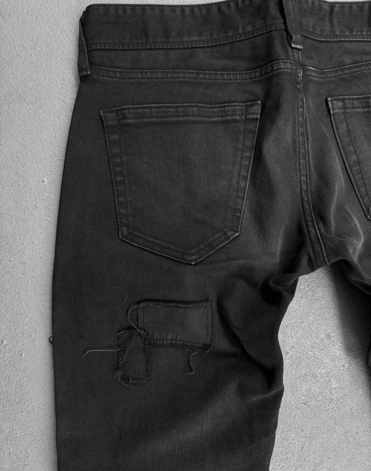 Black by VANQUISH Distressed Patchwork Low-rise Skinny Denim