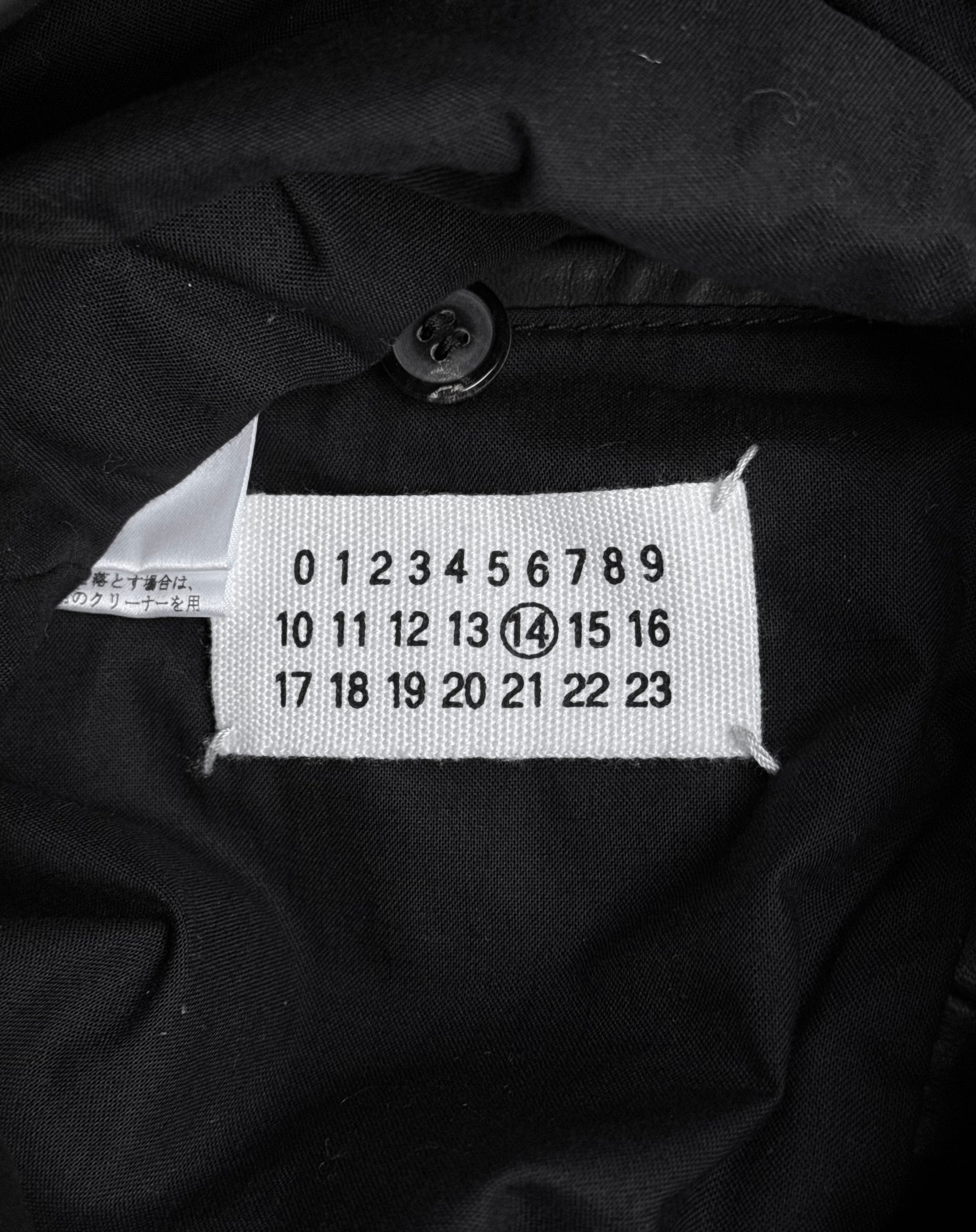 Maison Martin Margiela AW10-11 Kokone Black Horse Leather 5-zip Jacket features a white label with black numbers (0–23), number 14 circled, and a black button above. Size 44 fits like a slim Medium.