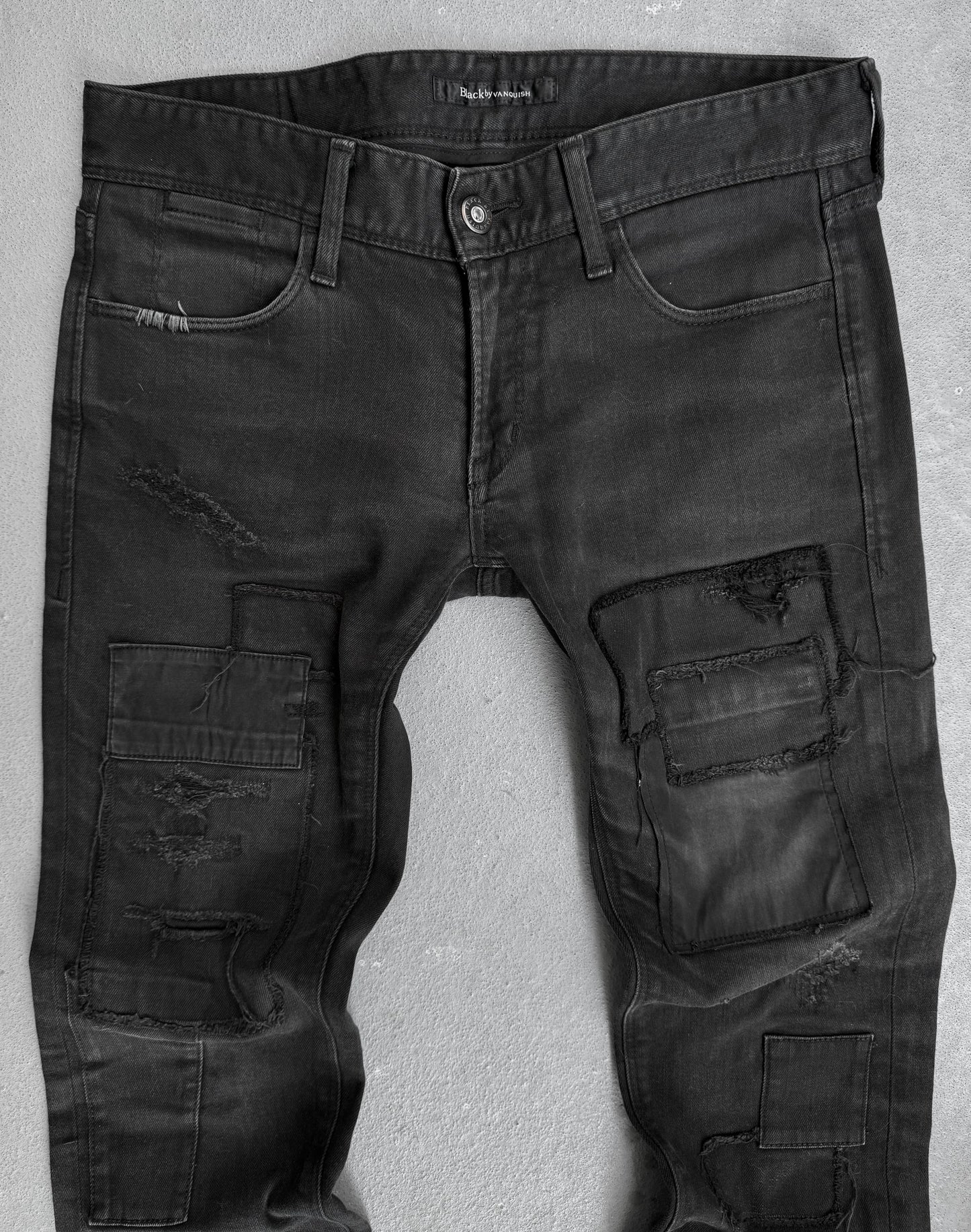 Black by VANQUISH Distressed Patchwork Low-rise Skinny Denim