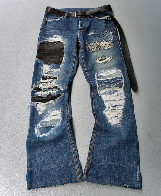 SHELLAC 00s ‘Crash’ Distressed Cowhide Patchwork Bootcut Denim