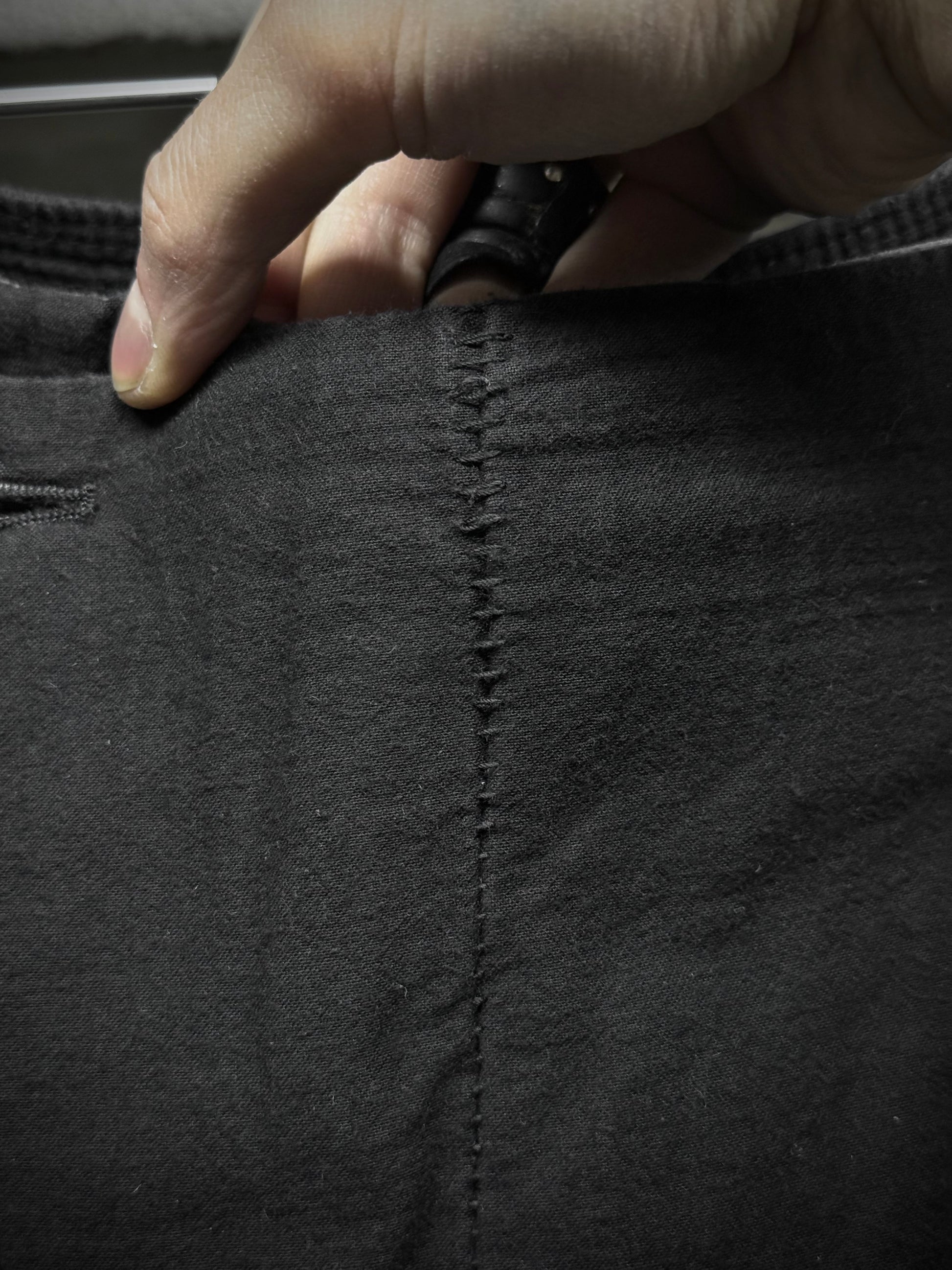 Masnada Washed Black Asymmetric Fly Overlock J-cut Pants detail | DRIEW GARMENTS