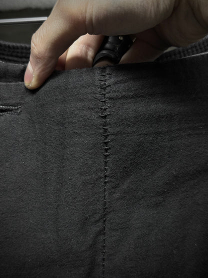 Masnada Washed Black Asymmetric Fly Overlock J-cut Pants detail | DRIEW GARMENTS