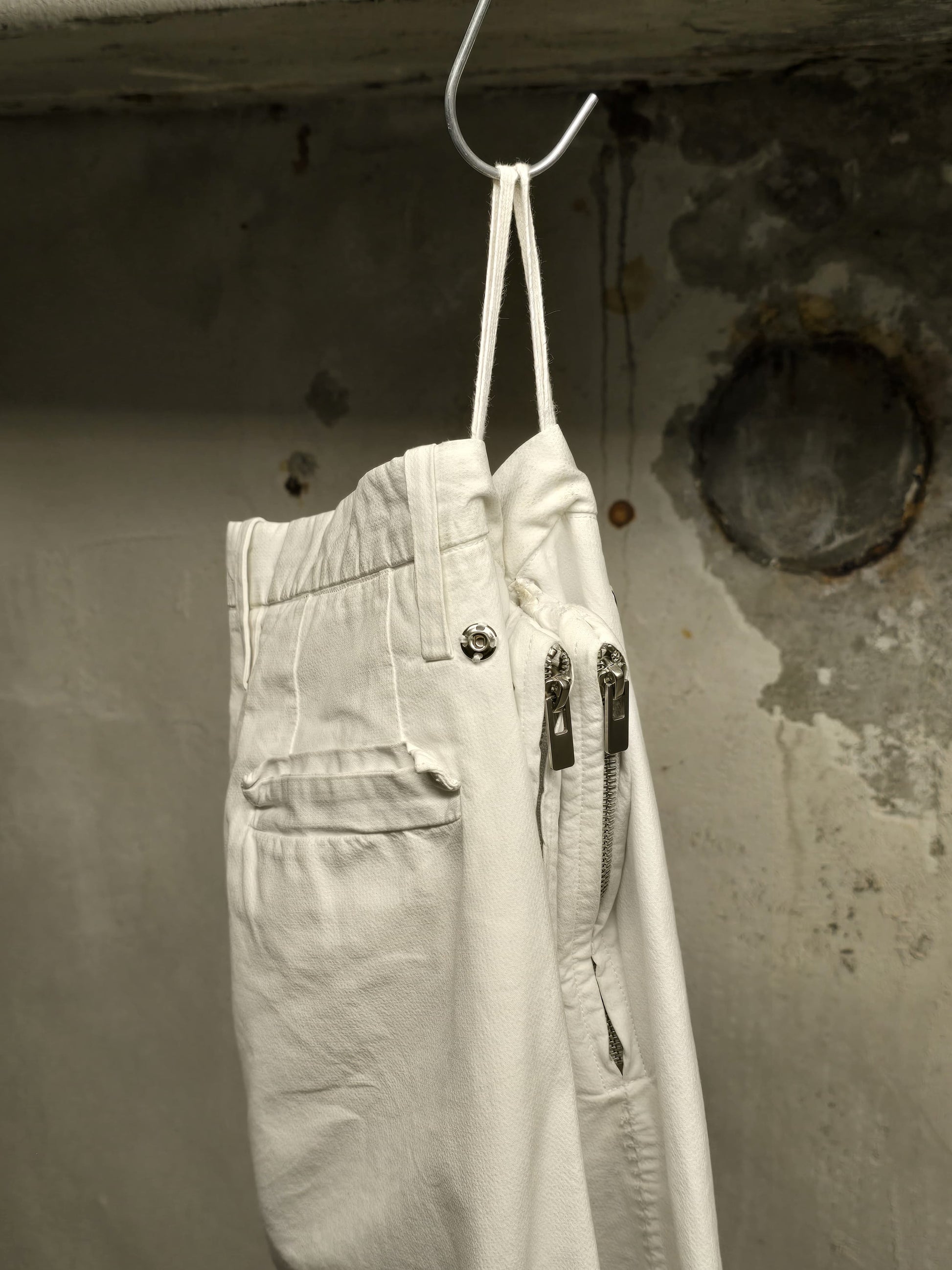 Carol Christian Poell 'PM/2671OD-IN BETWEEN/2' Object-dyed Visible Meltlock Front Zip Trousers detail | DRIEW GARMENTS