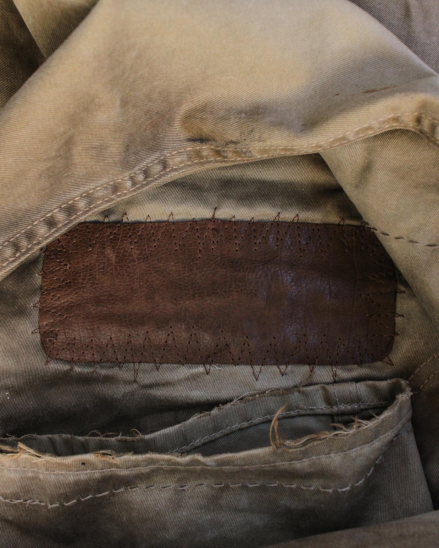 cow leather patch zig zag stitch Isamu Katayama “Backlash” SS11 ‘Chinocross’ Dirty Mud Wash Bootcut Pants