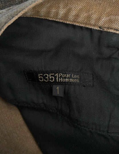 Close-up of a label on a piece of clothing with '5351 Pour Les Hermes' text.