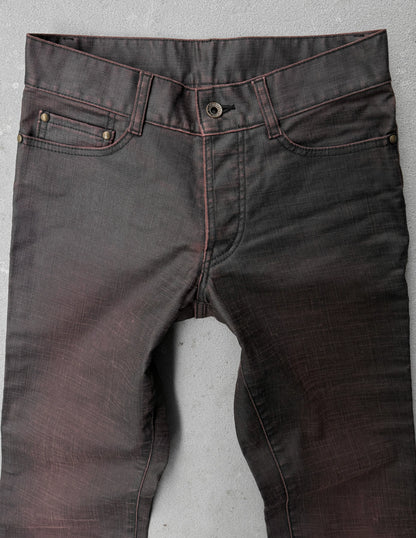 Dark gray jeans on a light gray background