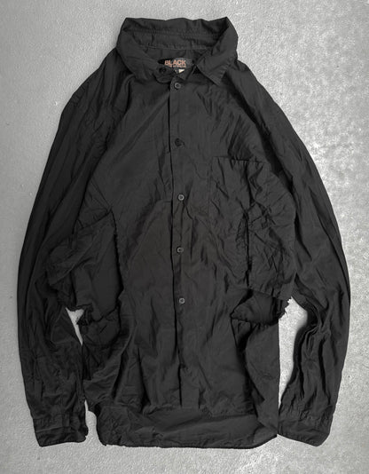 BLACK COMME des GARÇONS SS19 Distressed Side Cut-Out Shirt