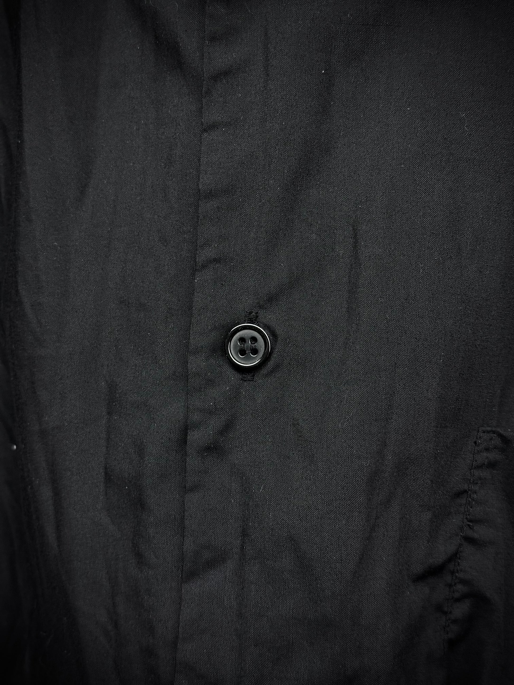 COMME des GARÇONS BLACK COMME des GARÇONS SS19 Distressed Side Cut-Out Shirt detail | DRIEW GARMENTS