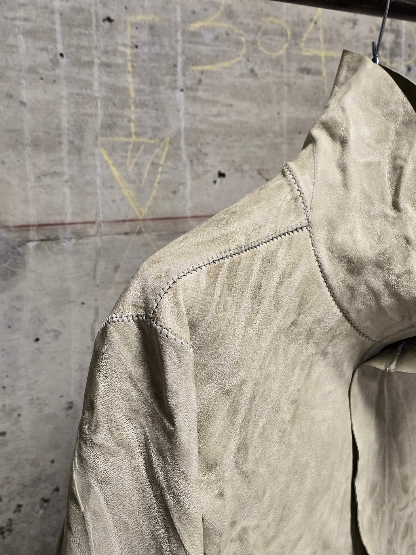 Isaac Sellam: “Experience” Pale Yellow Overlock High Neck Metal Spine Lambskin Leather Jacket