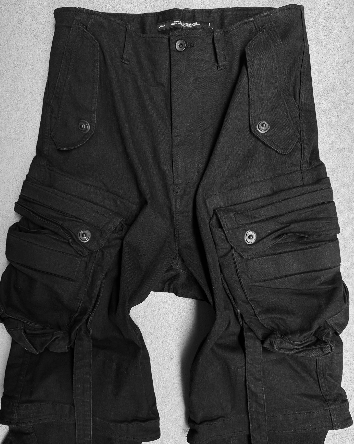 Julius_7 AW22-23 "_PERMANENT" Double Layered Twisted Gas-Mask Cargo Pants
