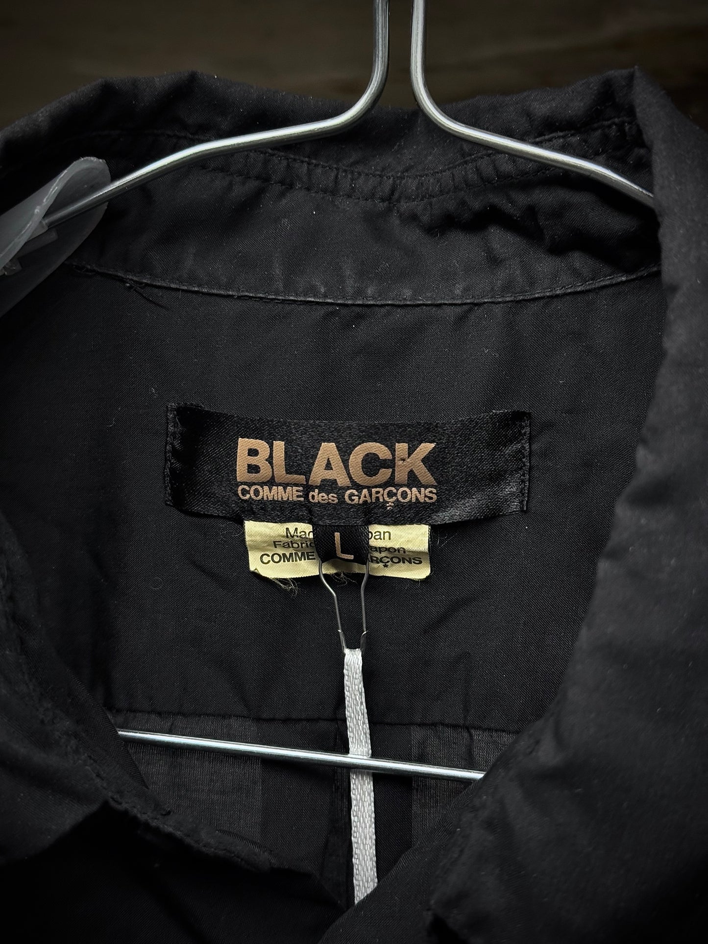 COMME des GARÇONS BLACK COMME des GARÇONS SS19 Distressed Side Cut-Out Shirt detail | DRIEW GARMENTS