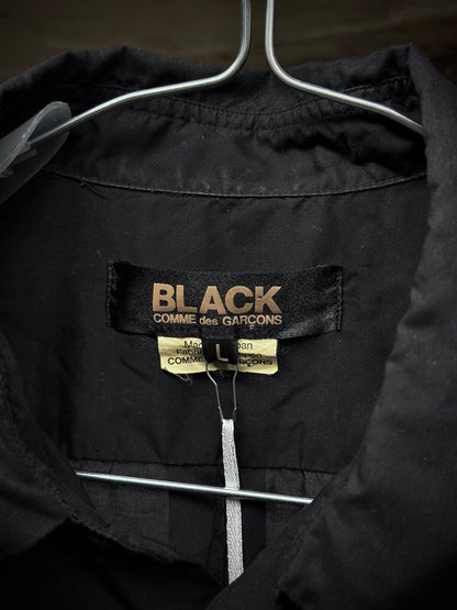 COMME des GARÇONS BLACK COMME des GARÇONS SS19 Distressed Side Cut-Out Shirt detail | DRIEW GARMENTS
